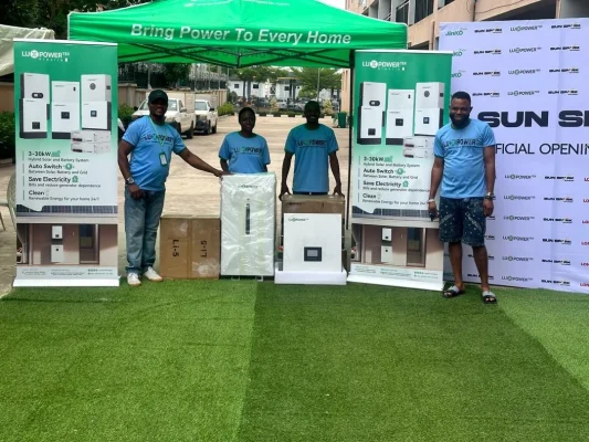 LuxpowerTek products displayed with local solar partners in Nigeria
